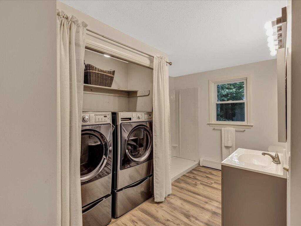 25 Moon Compass Lane Sandwich, MA 02563 - Photo 25 of 55 a utility room with dryer and washer