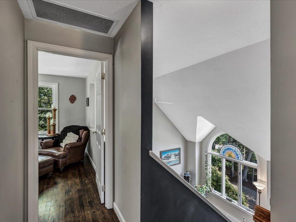 25 Moon Compass Lane Sandwich, MA 02563 - Photo 42 of 55 a view of a hallway and a livingroom with furniture