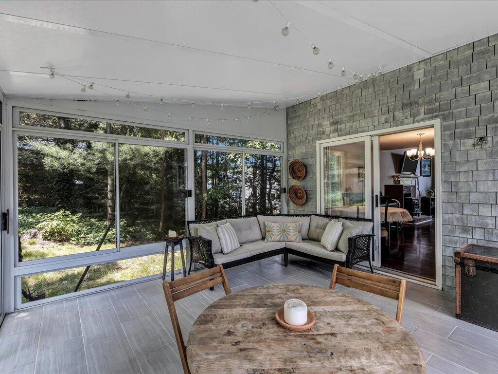 25 Moon Compass Lane Sandwich, MA 02563 - Photo 44 of 55 a living room with furniture and a large window