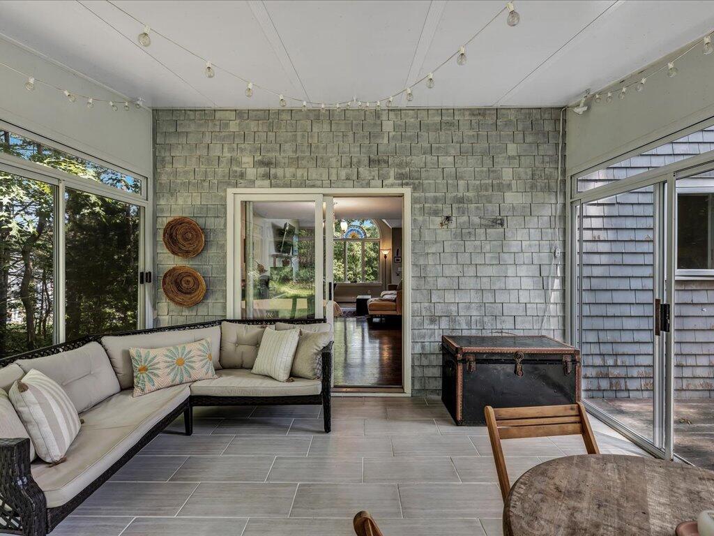 25 Moon Compass Lane Sandwich, MA 02563 - Photo 45 of 55 a living room with furniture and a fireplace