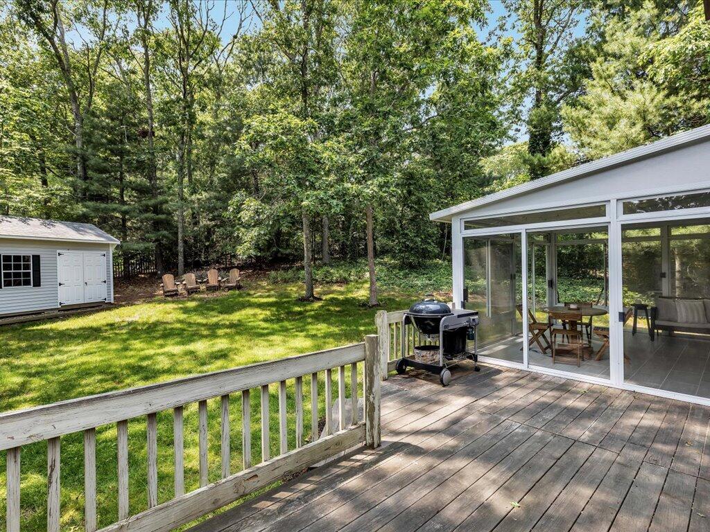 25 Moon Compass Lane Sandwich, MA 02563 - Photo 48 of 55 a view of a house with backyard and sitting area