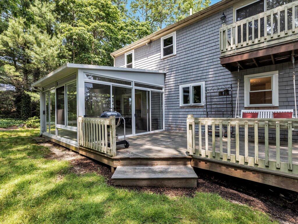 25 Moon Compass Lane Sandwich, MA 02563 - Photo 50 of 55 a house view with a garden space
