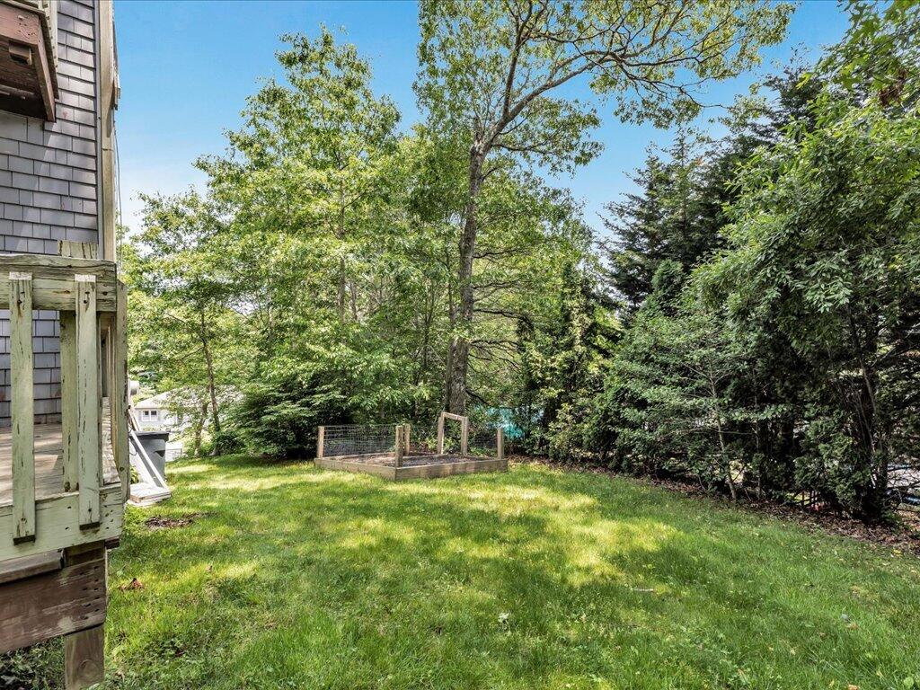 25 Moon Compass Lane Sandwich, MA 02563 - Photo 54 of 55 a view of house with yard