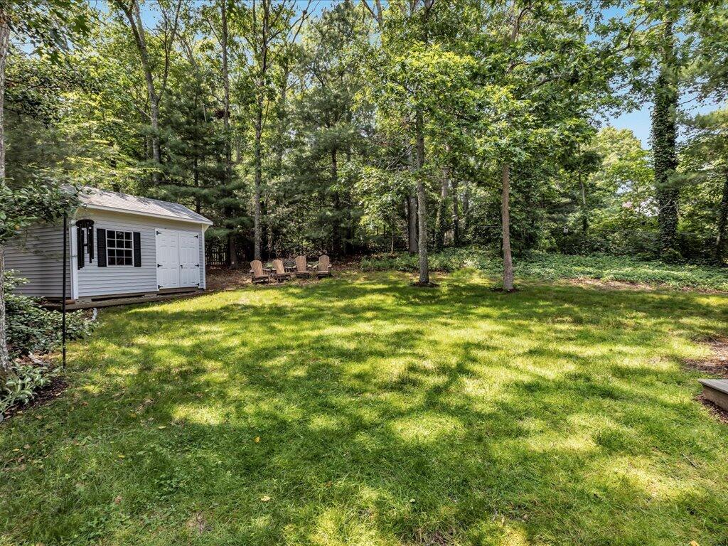 25 Moon Compass Lane Sandwich, MA 02563 - Photo 55 of 55 a swimming pool with outdoor seating and yard