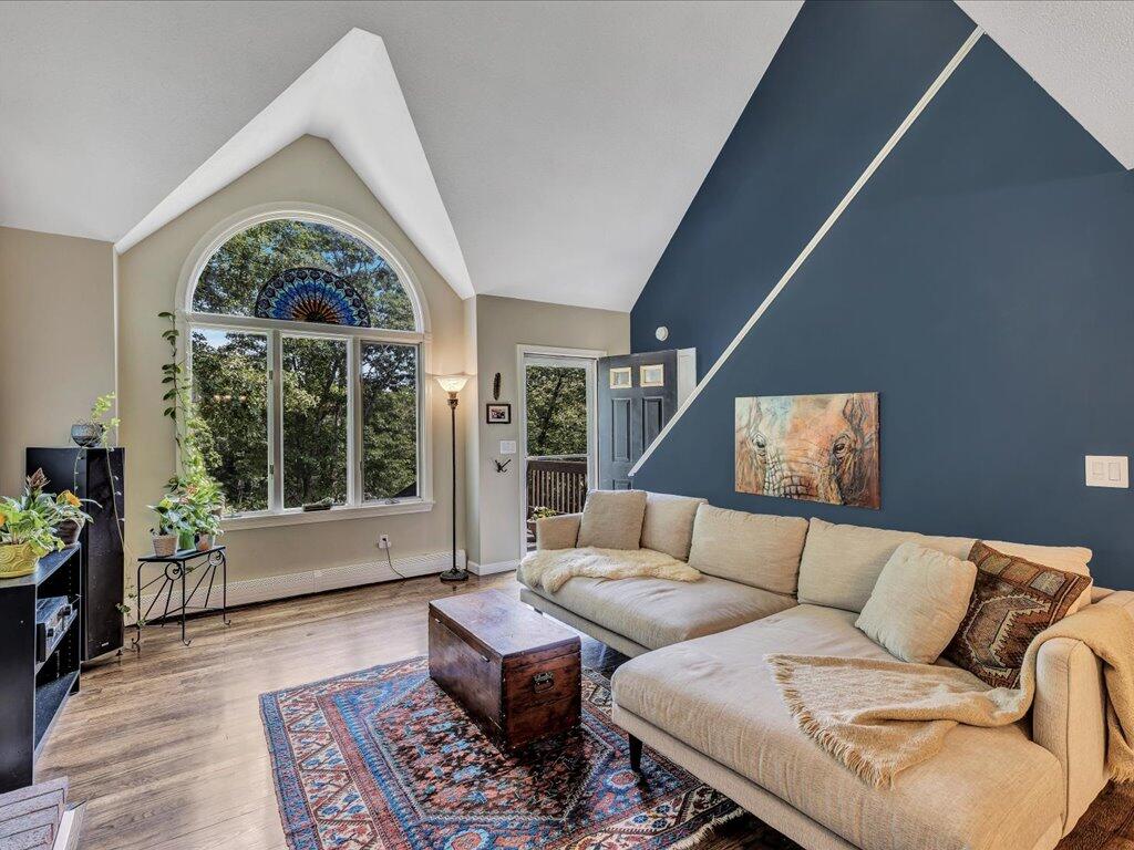 25 Moon Compass Lane Sandwich, MA 02563 - Photo 10 of 55 a living room with furniture and a large window