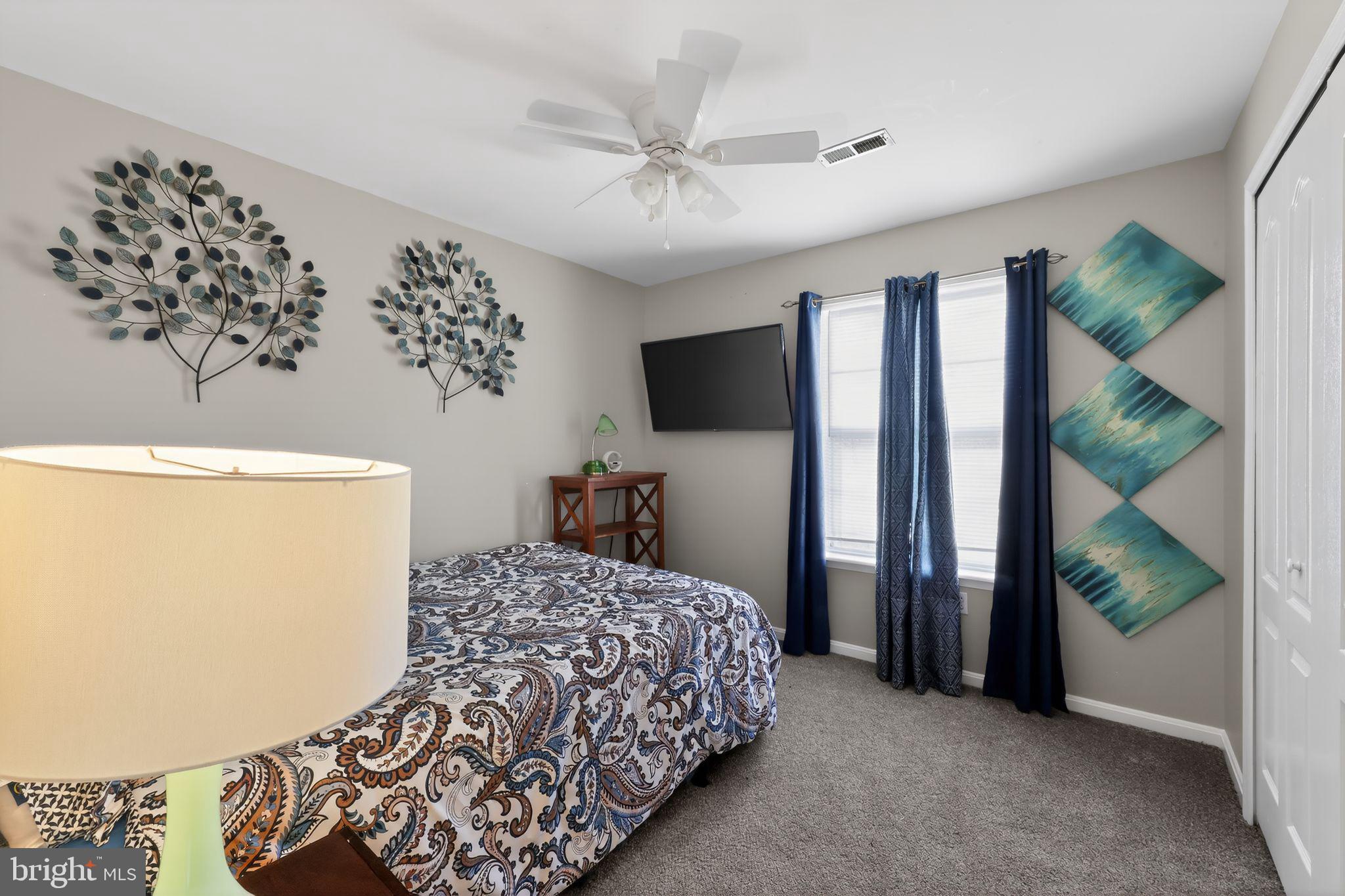 144 Plain Dealing Road Magnolia, DE 19962 - Photo 21 of 32 Serene bedroom with artistic accents.