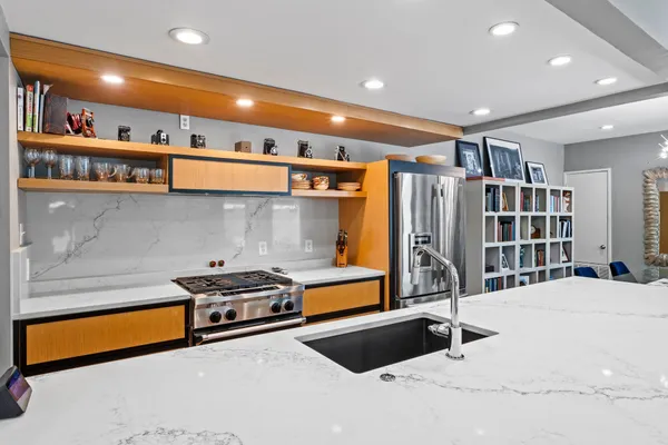 a bedroom with a bed and a gym equipment