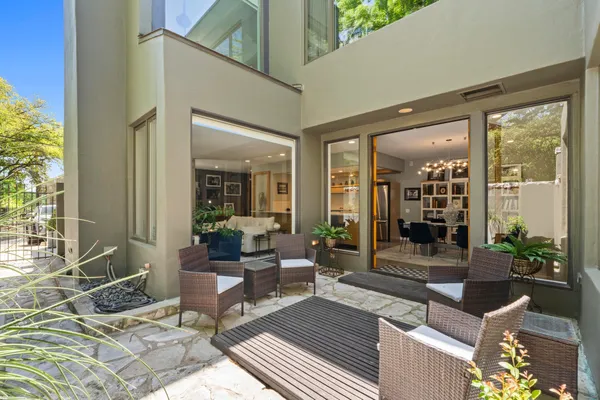 a building outdoor space with patio furniture