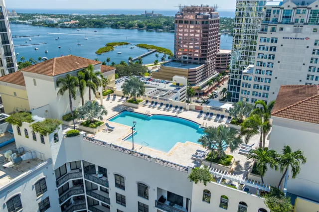 an aerial view of a city with lake view