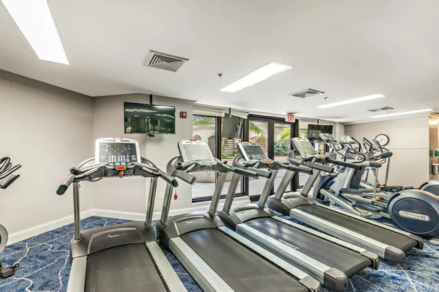 a view of a room with gym equipment