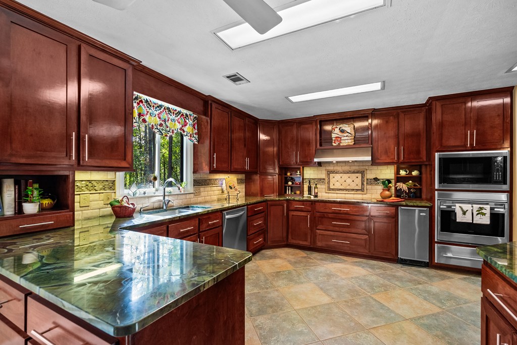 7023 Cartledge Road Box Springs, GA 31801 - Photo 9 of 44 Gourmet kitchen w/designer tile floors