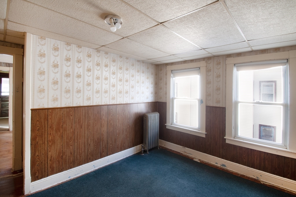 39-41 Malden Street Springfield, MA 01108 - Photo 20 of 27 an empty room with windows