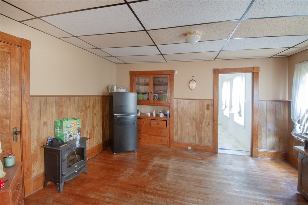 39-41 Malden Street Springfield, MA 01108 - Photo 5 of 27 a view of livingroom with furniture and wooden floor