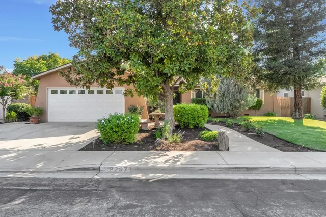 front view of a house with a street
