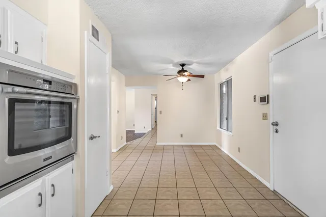 a view of a kitchen cabinets a sink and dishwasher in a kitchen