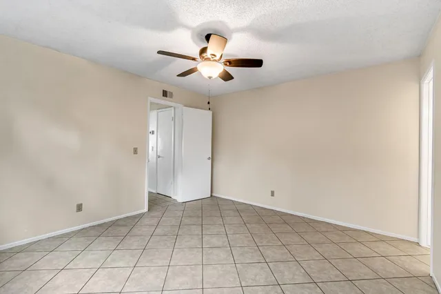 a bathroom with a sink vanity and a mirror