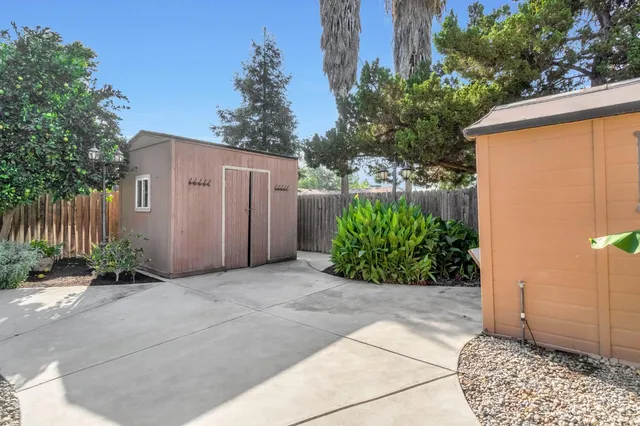 a view of a house with a swimming pool