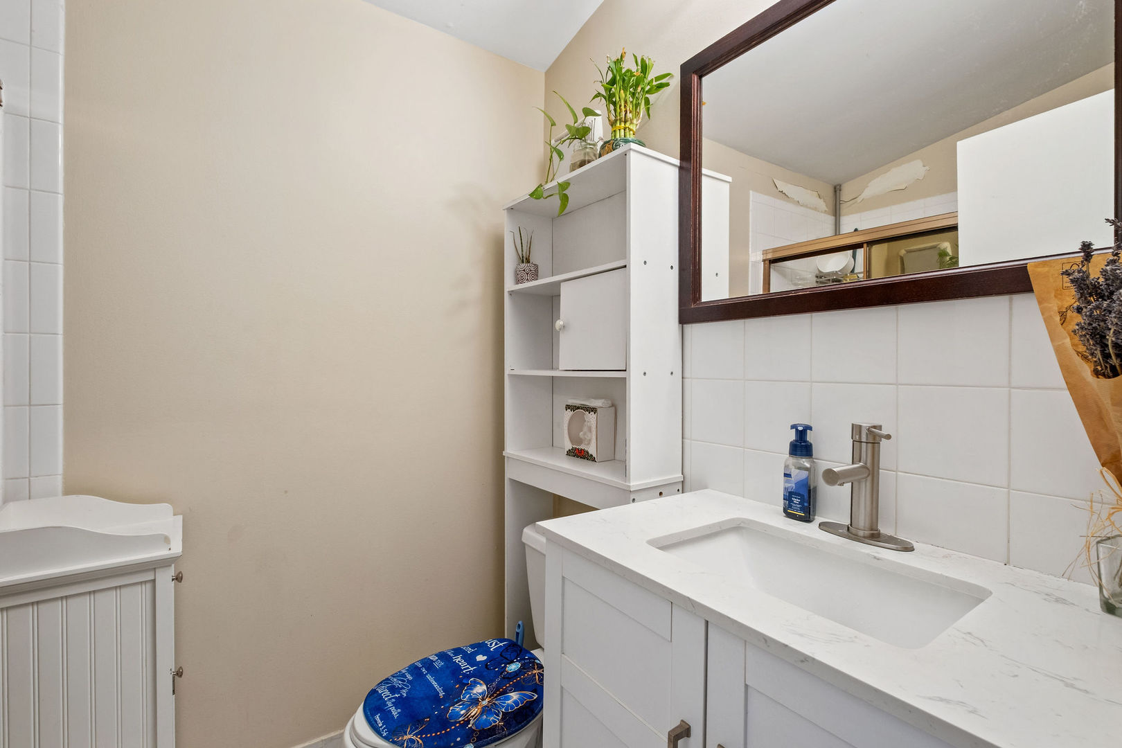 1578 Woodland Avenue, Unit D Des Plaines, IL 60016 - Photo 10 of 17 a kitchen with a sink a cabinets and utility room