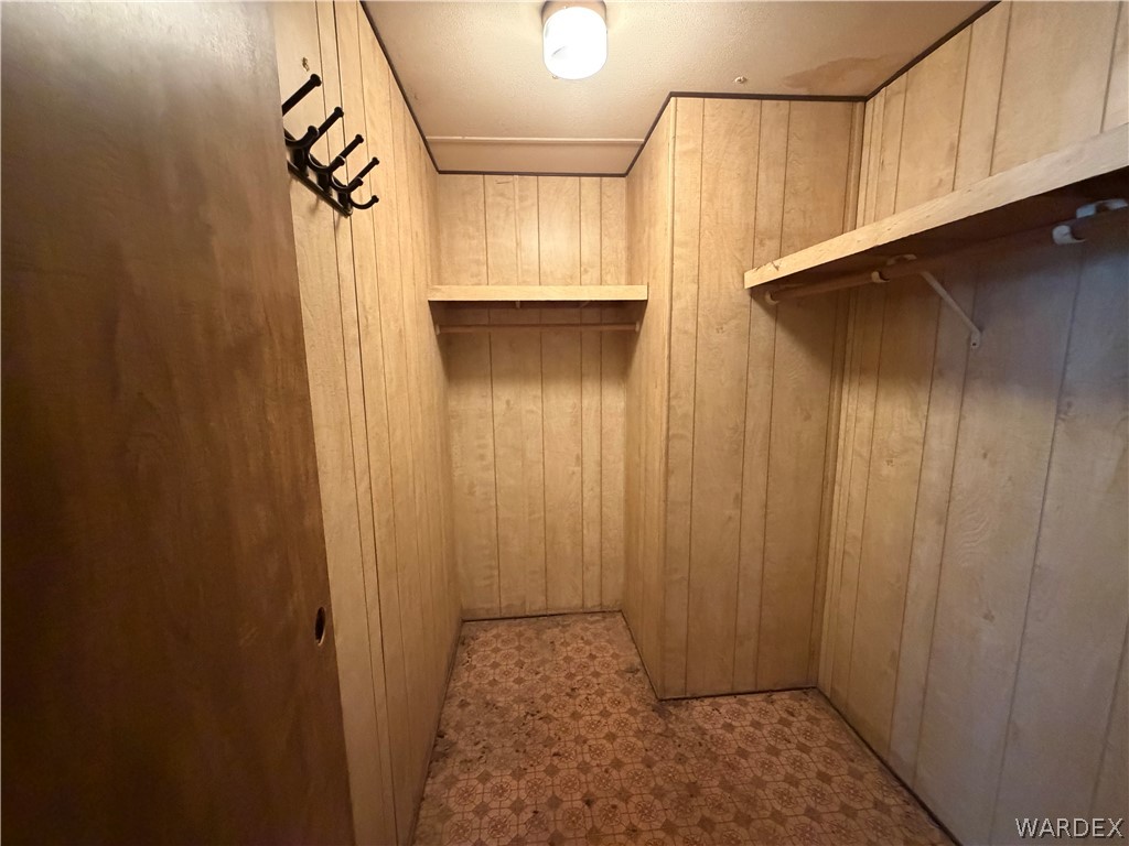 1666 Talc Road Bullhead City, AZ 86442 - Photo 25 of 61 Primary closet with shelving