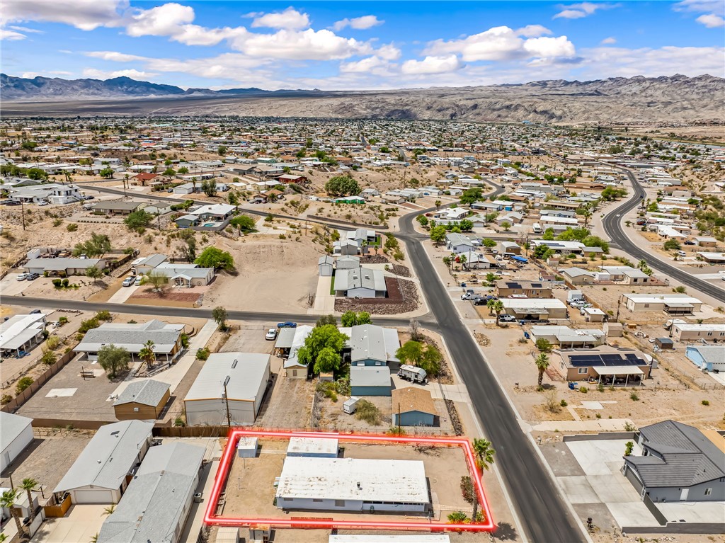 1666 Talc Road Bullhead City, AZ 86442 - Photo 60 of 61 Property with a flat roof structure and an expansive lot