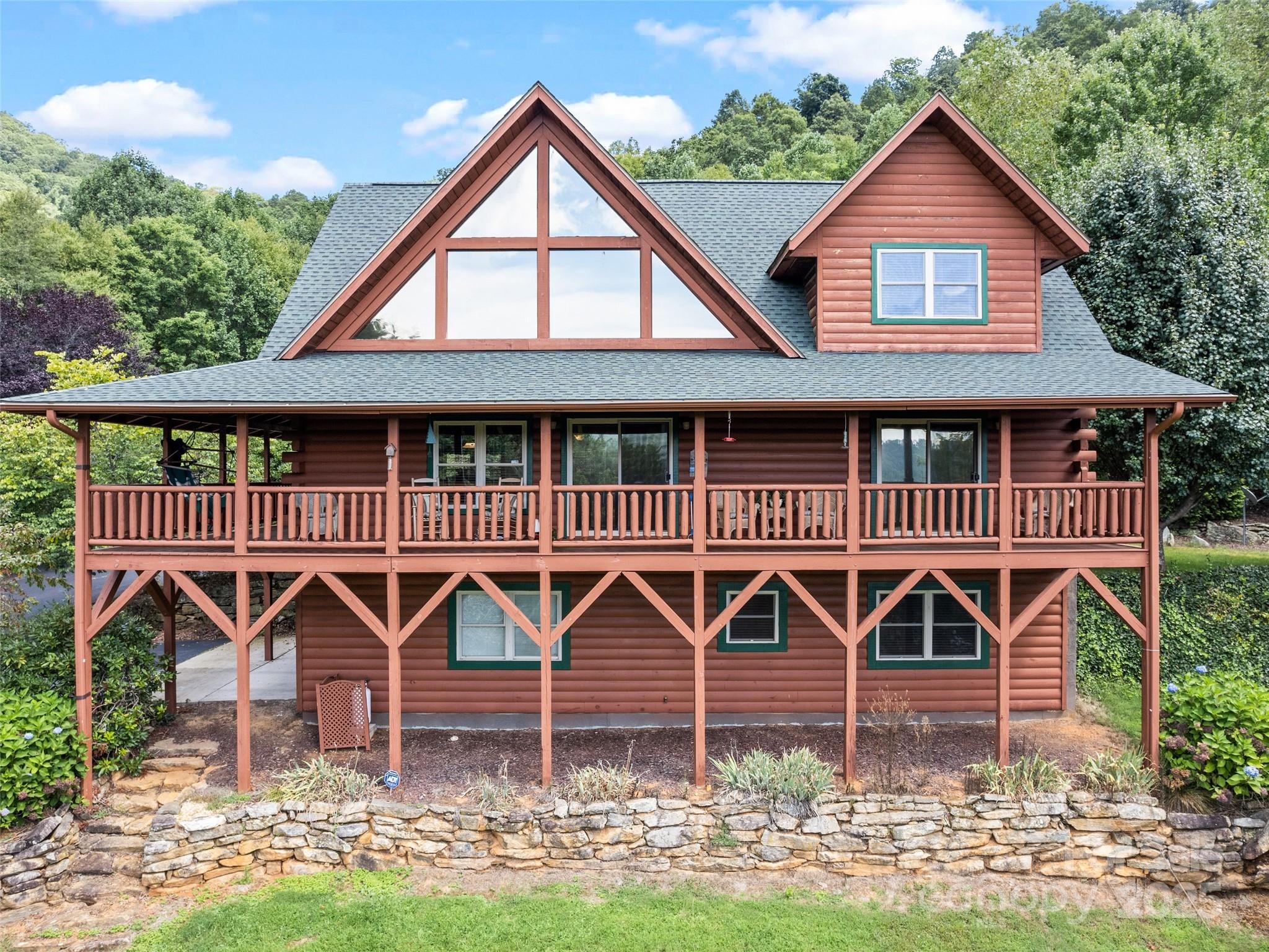a front view of a house with porch