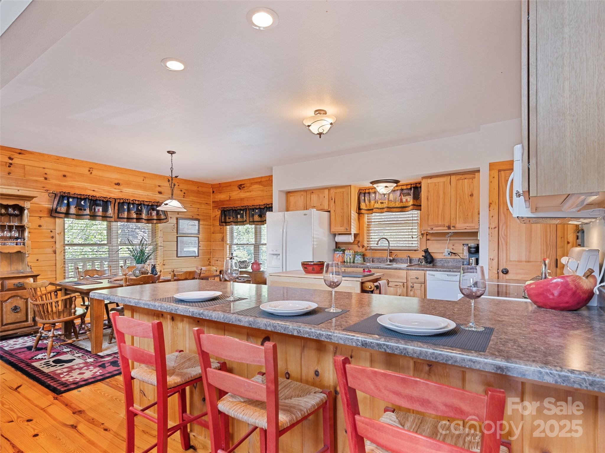 432 Raccoon Point Waynesville, NC 28786 - Photo 13 of 48 a very nice looking dining room with a large window