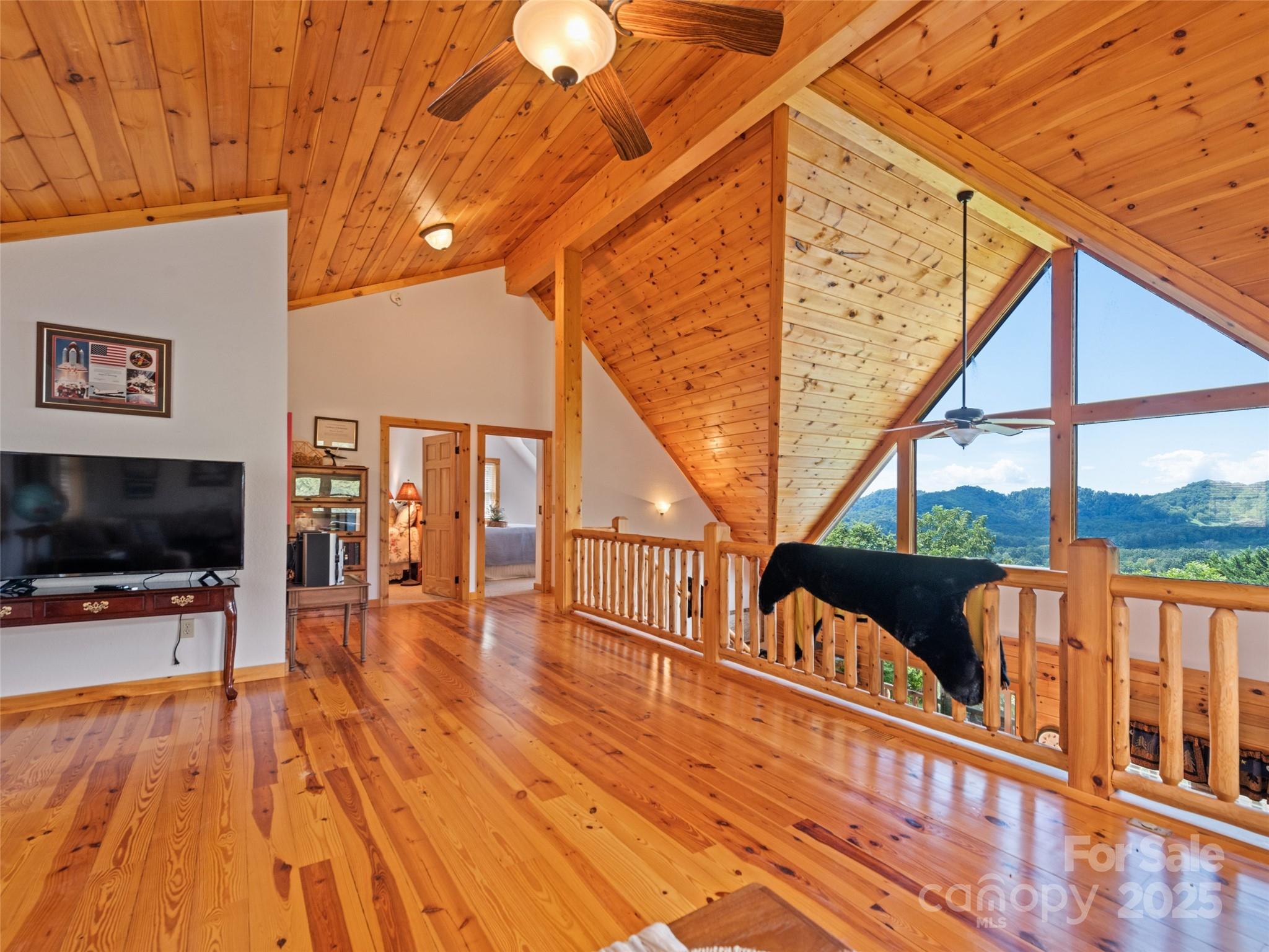 432 Raccoon Point Waynesville, NC 28786 - Photo 25 of 48 a view of living room with furniture and flat screen tv