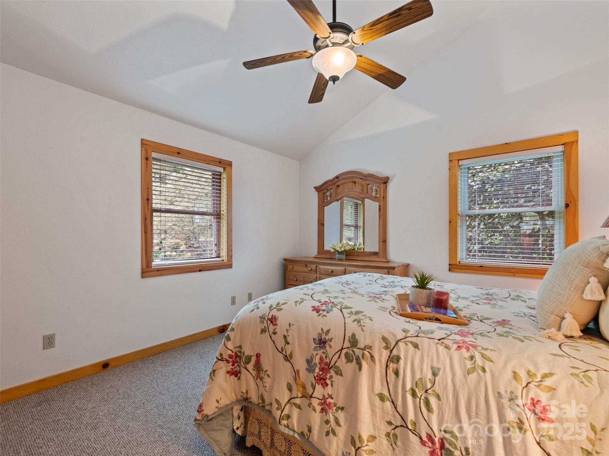 432 Raccoon Point Waynesville, NC 28786 - Photo 29 of 48 a bedroom with a bed and a window