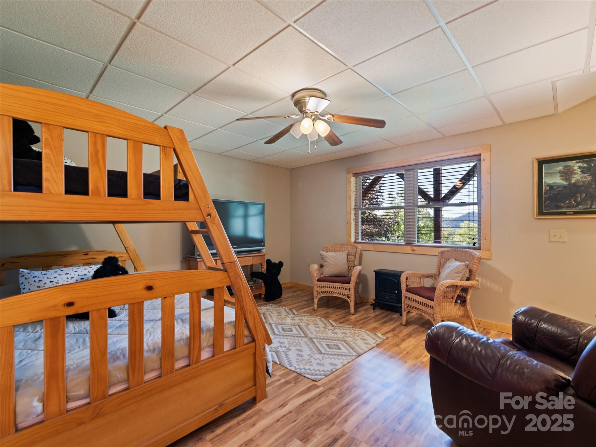 432 Raccoon Point Waynesville, NC 28786 - Photo 34 of 48 a bedroom with furniture and a window