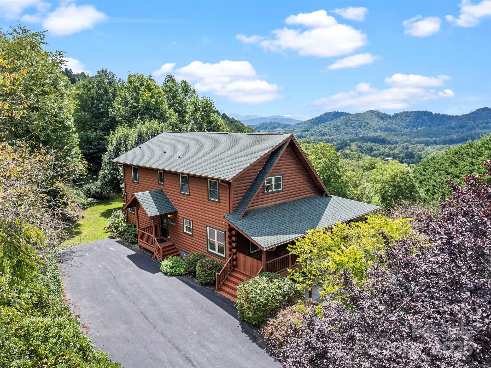 432 Raccoon Point Waynesville, NC 28786 - Photo 40 of 48 an aerial view of a house with a yard