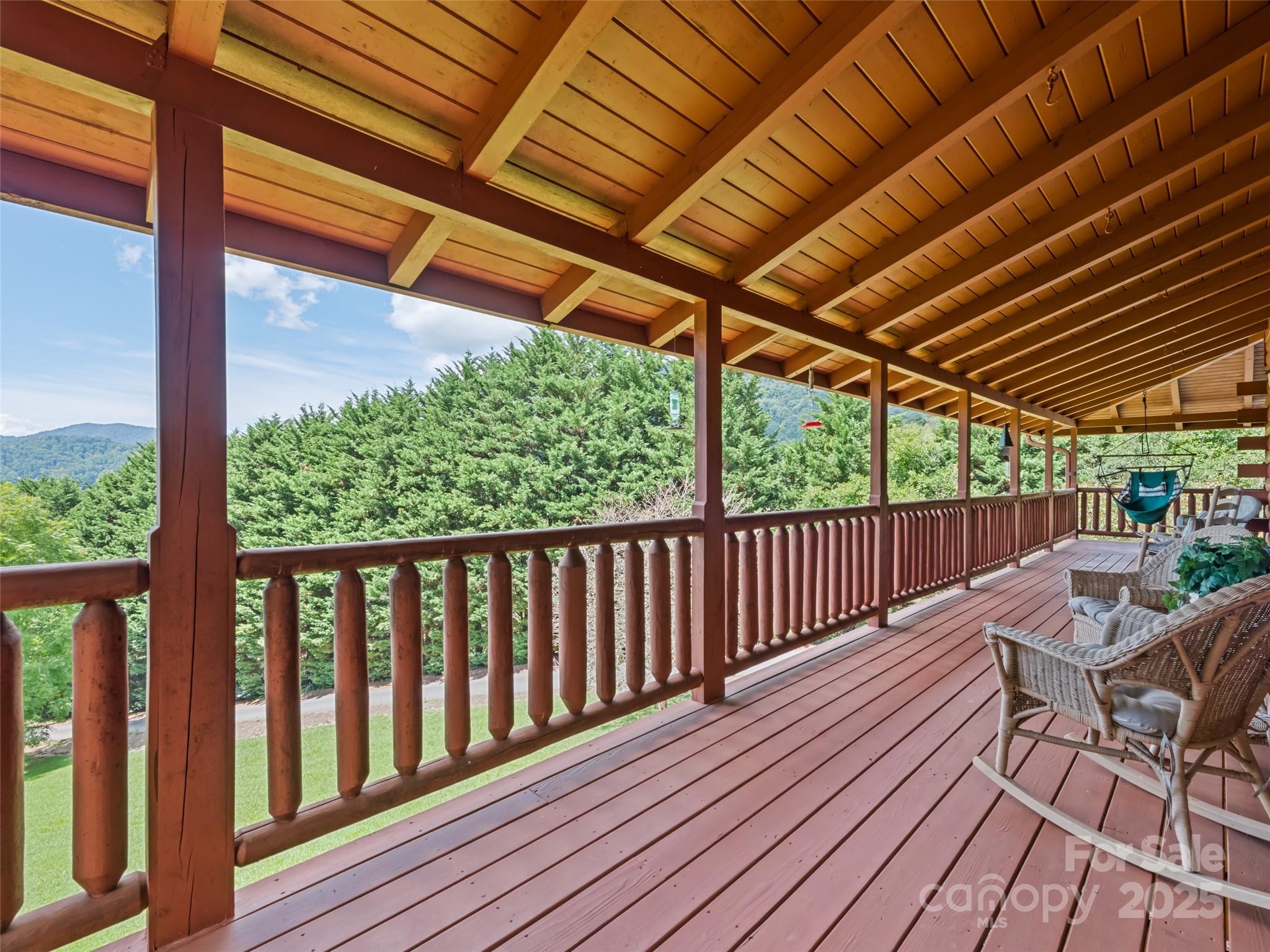 432 Raccoon Point Waynesville, NC 28786 - Photo 4 of 48 a view of a two chairs in the balcony