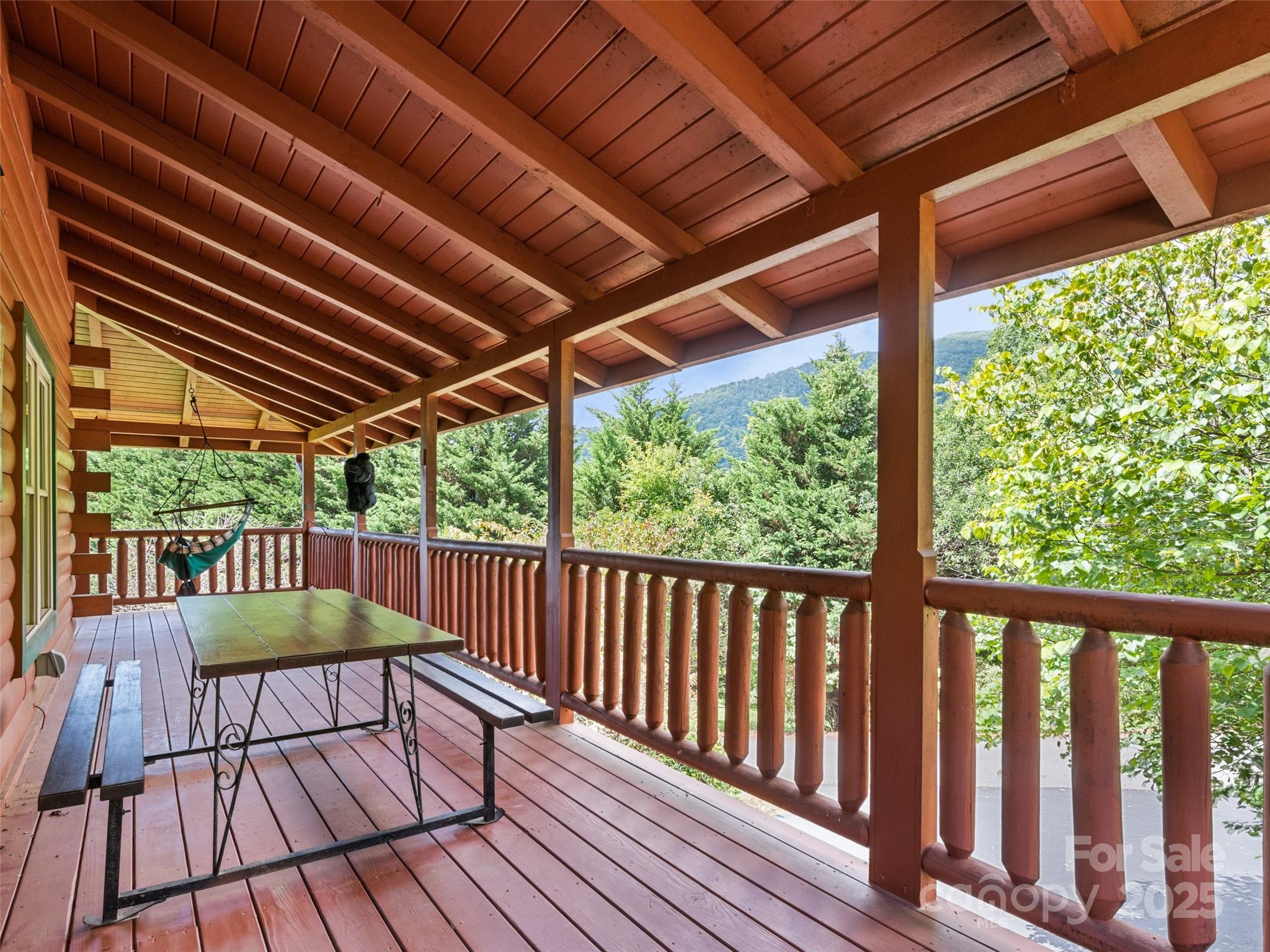 432 Raccoon Point Waynesville, NC 28786 - Photo 6 of 48 a view of a wooden deck