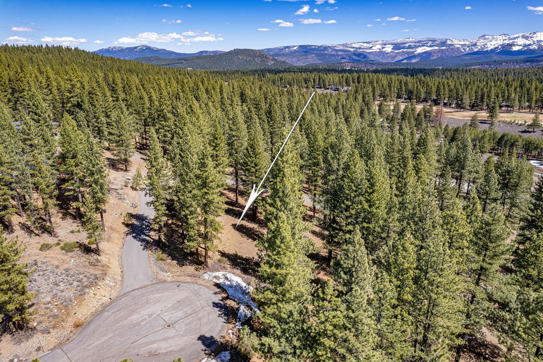 10576 Brickell Court Truckee, CA 96161 - Photo 17 of 21 a view of a lake with a mountain in the background