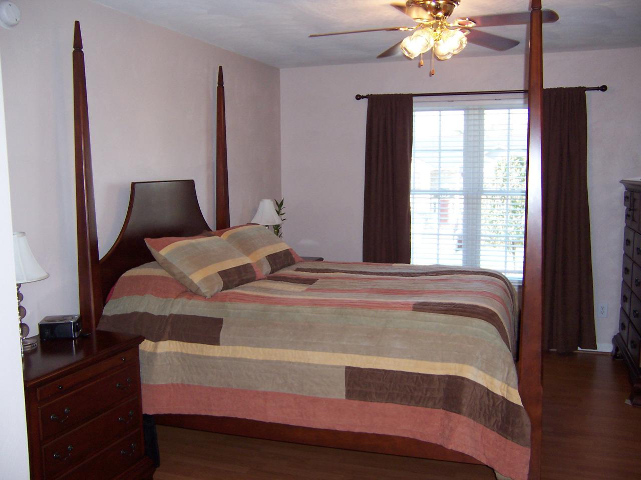 1712 Meadows Road Vinton, VA 24179 - Photo 8 of 23 a bedroom with a bed and window