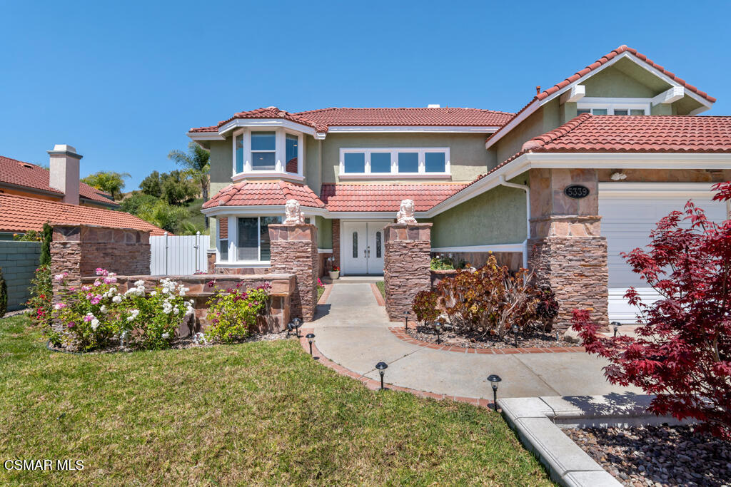 5339 Seneca Place Simi Valley, CA 93063 - Photo 67 of 76 a front view of a house with garden