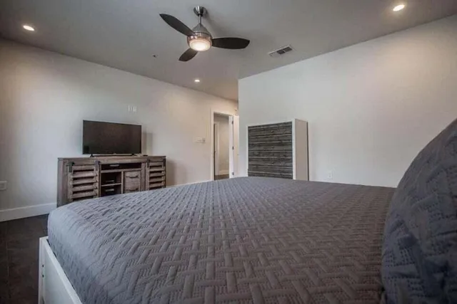 a view of a livingroom with a flat screen tv