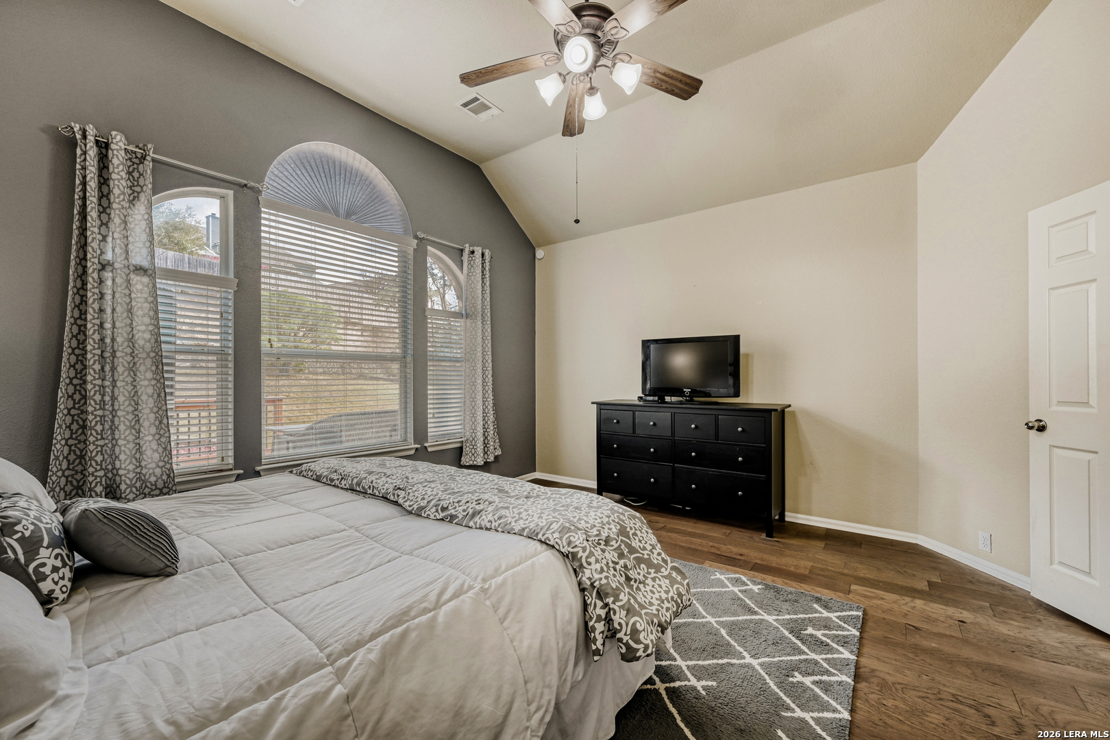 10539 Rainbow View Helotes, TX 78023 - Photo 12 of 24 a bedroom with a bed and a television