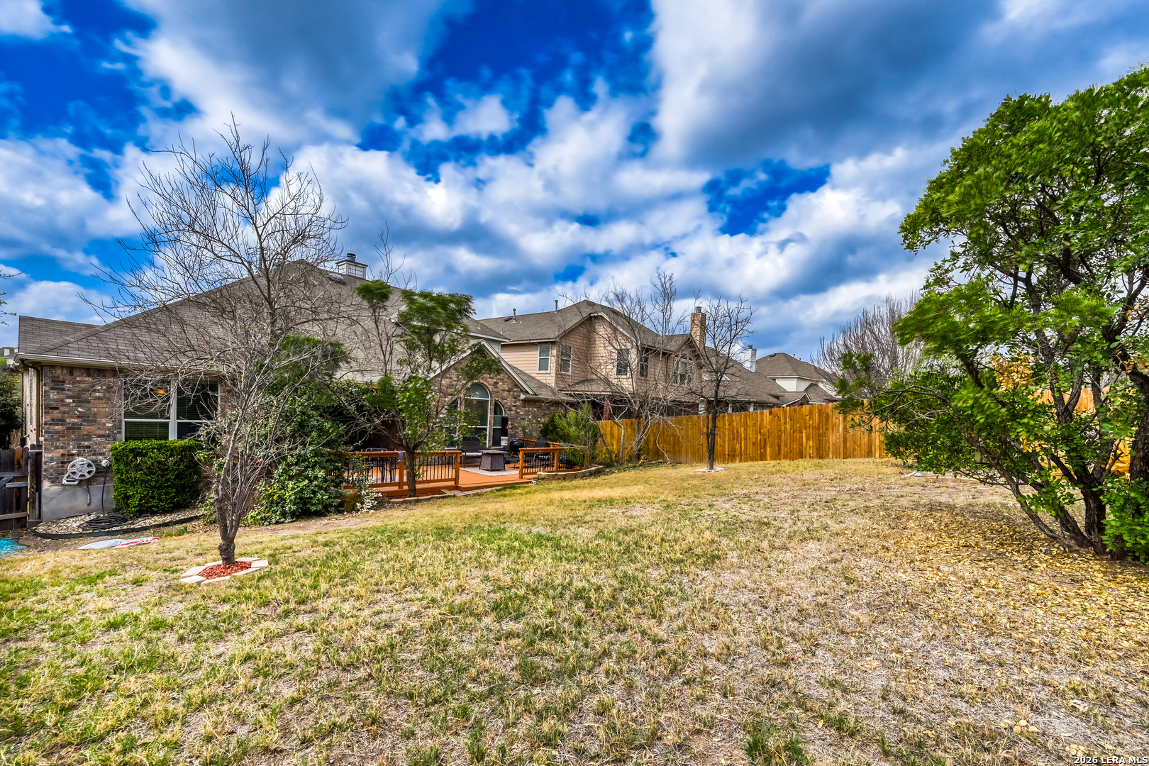 10539 Rainbow View Helotes, TX 78023 - Photo 23 of 24 a view of a house with a snow in a yard