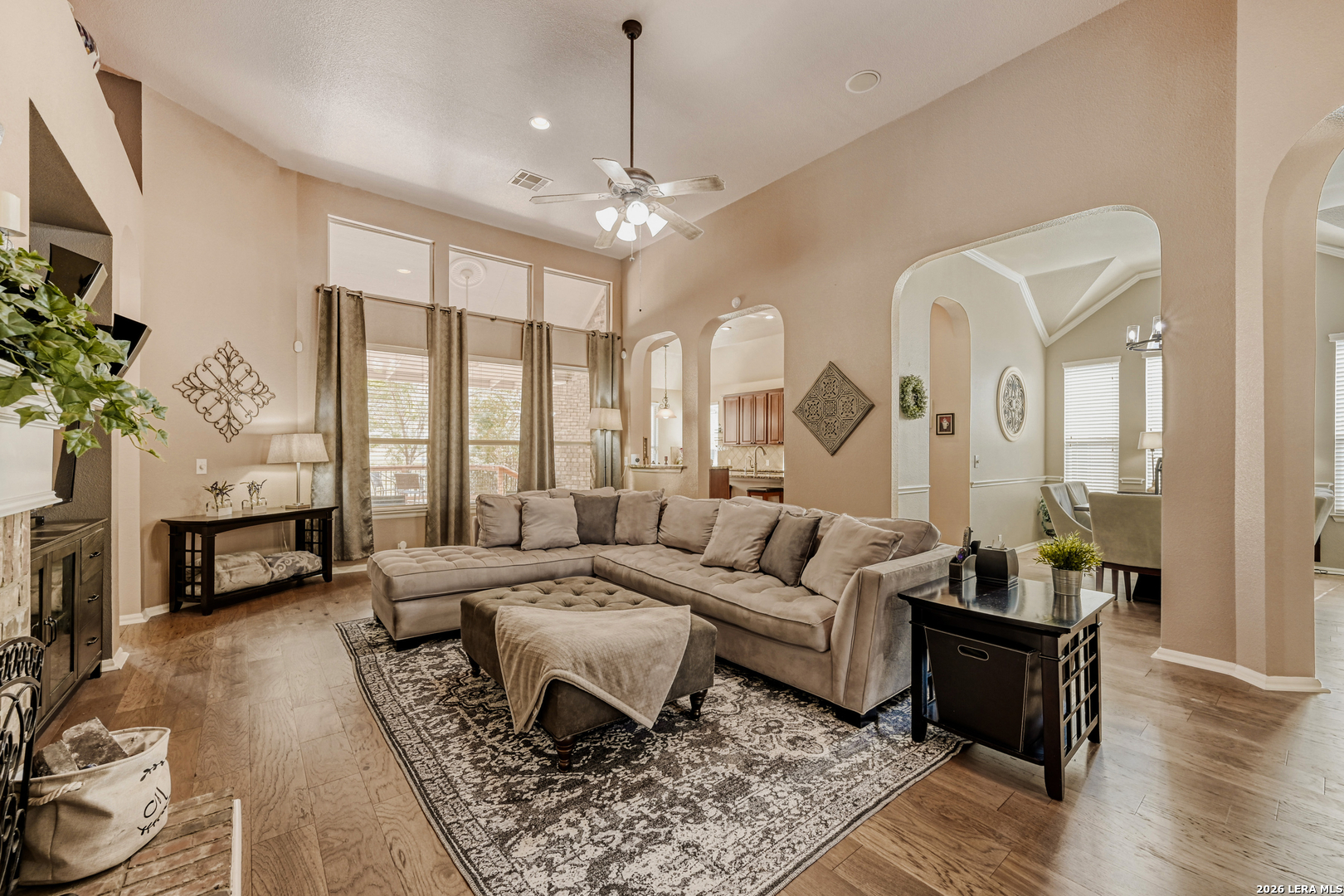 10539 Rainbow View Helotes, TX 78023 - Photo 4 of 24 a living room with furniture fireplace and a large window