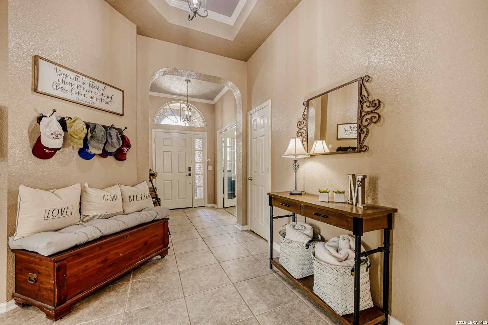 10539 Rainbow View Helotes, TX 78023 - Photo 5 of 24 a spacious bedroom with a bed and a table in it