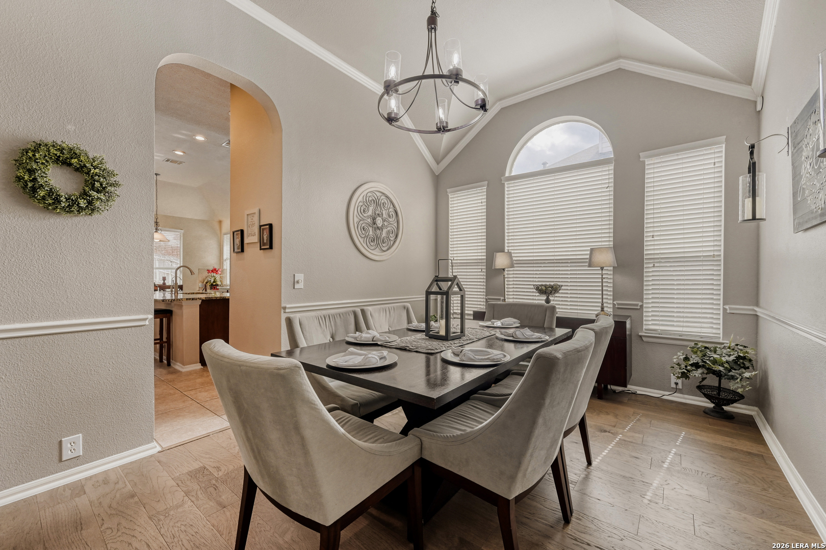 10539 Rainbow View Helotes, TX 78023 - Photo 6 of 24 a view of a dining room with furniture and a chandelier