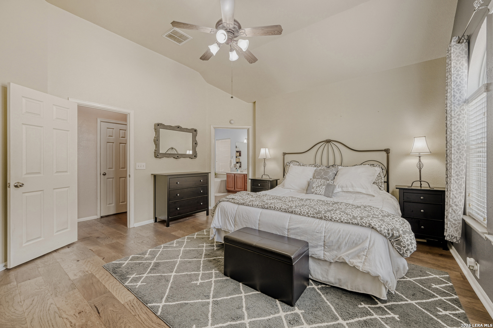 10539 Rainbow View Helotes, TX 78023 - Photo 10 of 24 a bedroom with a bed and a fireplace