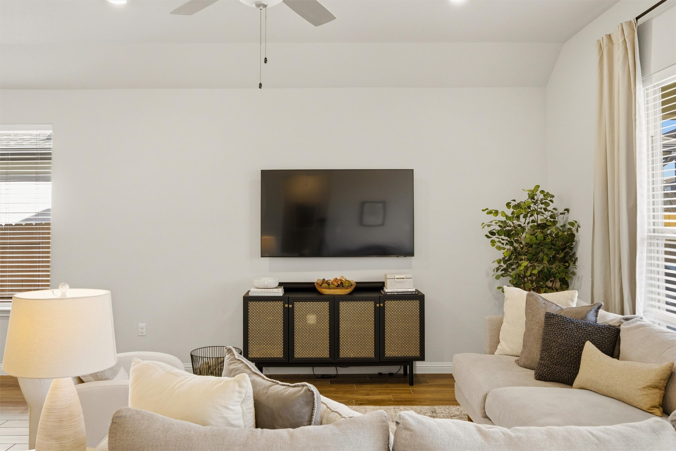 7905 Corrigan Pass Austin, TX 78744 - Photo 15 of 36 Wood-look tile flooring adds both durability and style to the main living space.