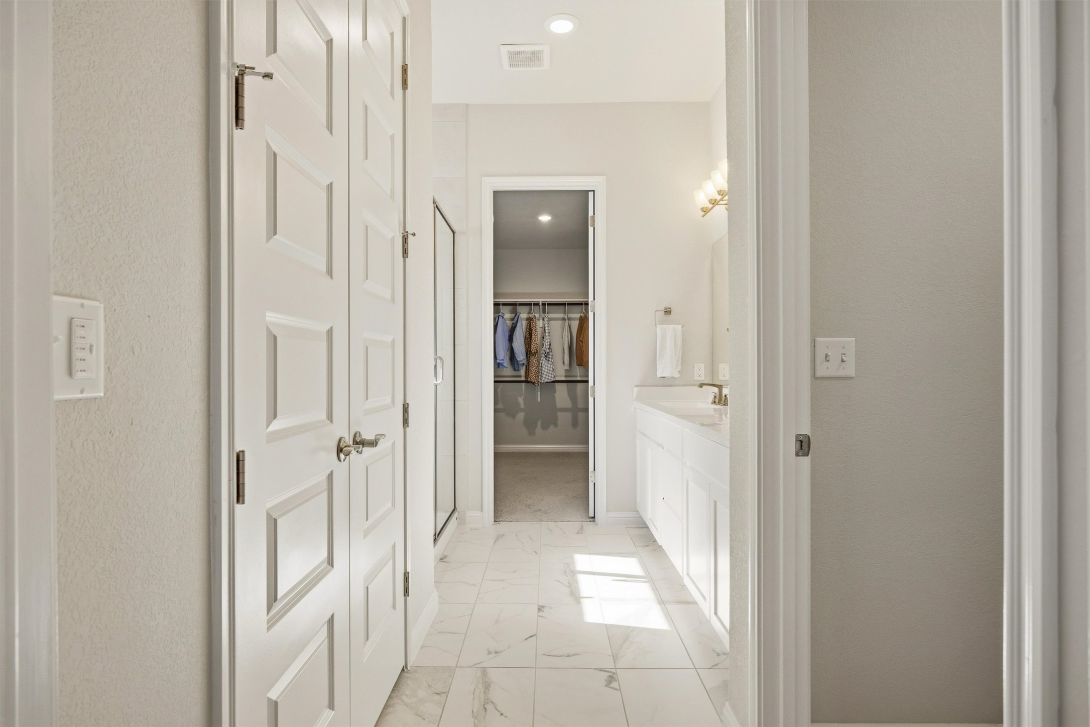 7905 Corrigan Pass Austin, TX 78744 - Photo 19 of 36 The private en-suite bath completes the relaxing primary suite.