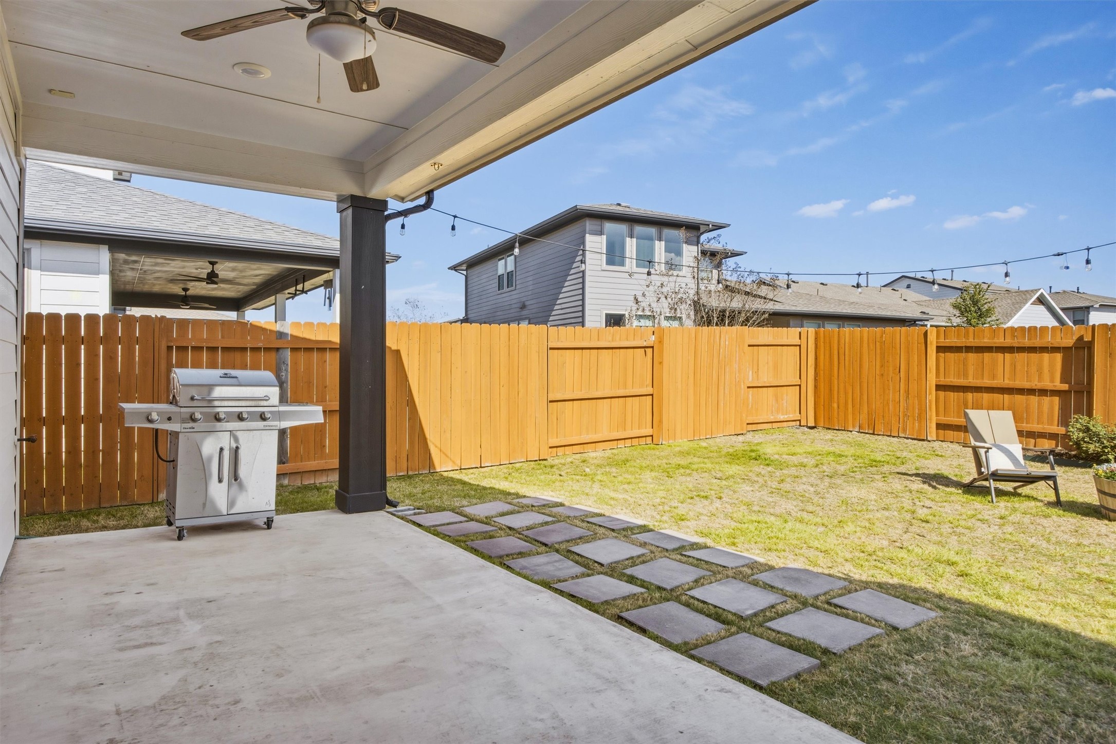 7905 Corrigan Pass Austin, TX 78744 - Photo 32 of 36 The covered back patio offers the perfect space for outdoor relaxation.