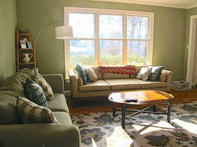 1919 Highland Place Raleigh, NC 27607 - Photo 4 of 19 a living room with furniture and a window
