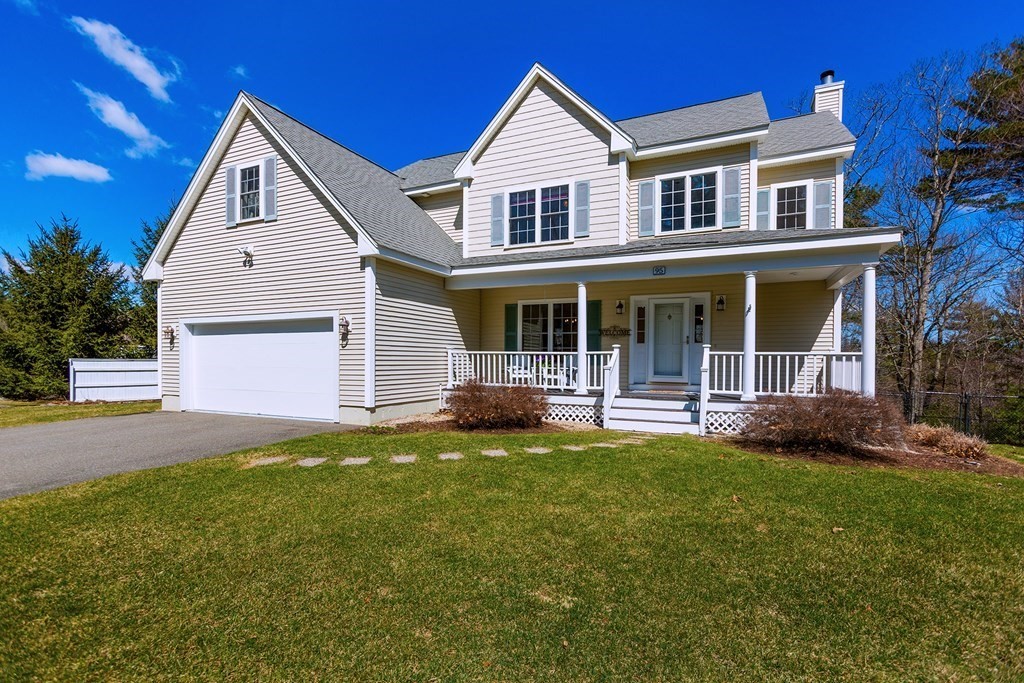 95 Lunenburg Road Townsend, MA 01474 - Photo 1 of 42 a front view of a house with a yard and garage
