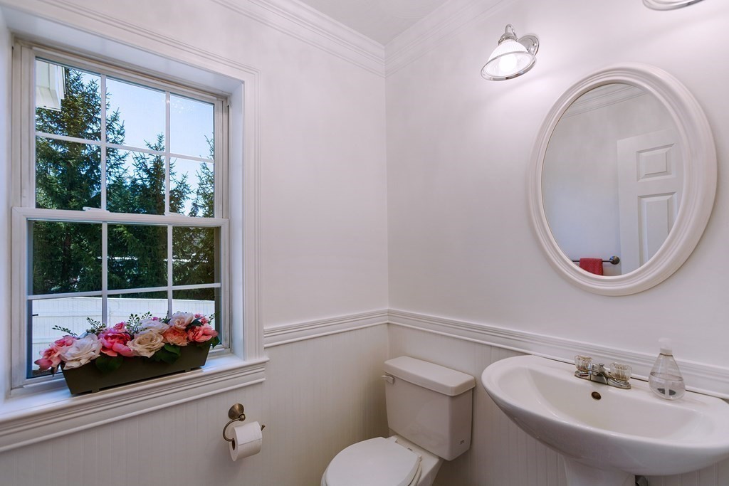 95 Lunenburg Road Townsend, MA 01474 - Photo 11 of 42 a bathroom with a sink mirror and toilet