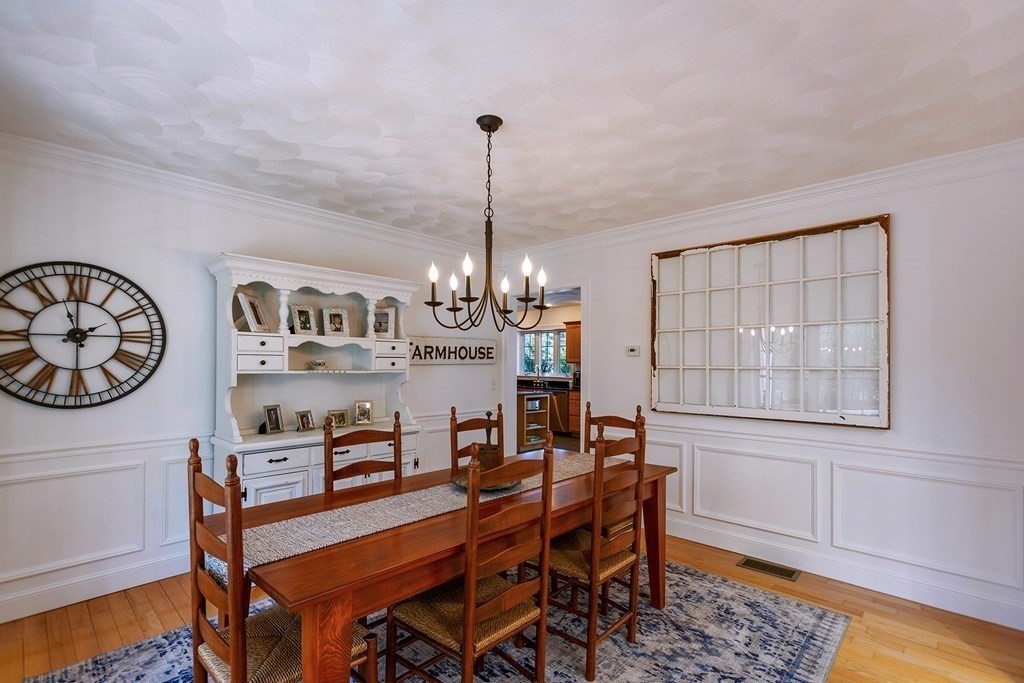 95 Lunenburg Road Townsend, MA 01474 - Photo 12 of 42 a view of a dining room with furniture and chandelier