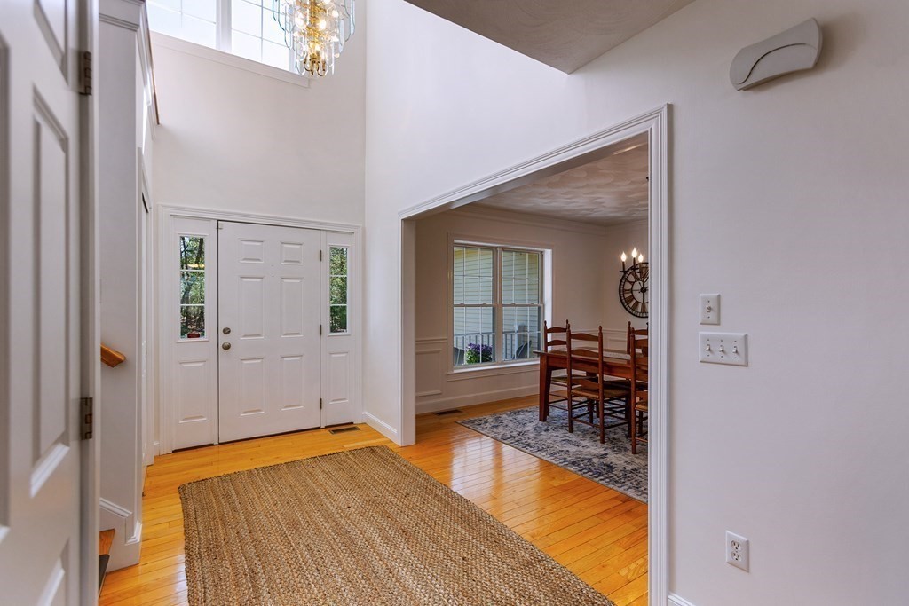 95 Lunenburg Road Townsend, MA 01474 - Photo 14 of 42 a bedroom with a bed and balcony view
